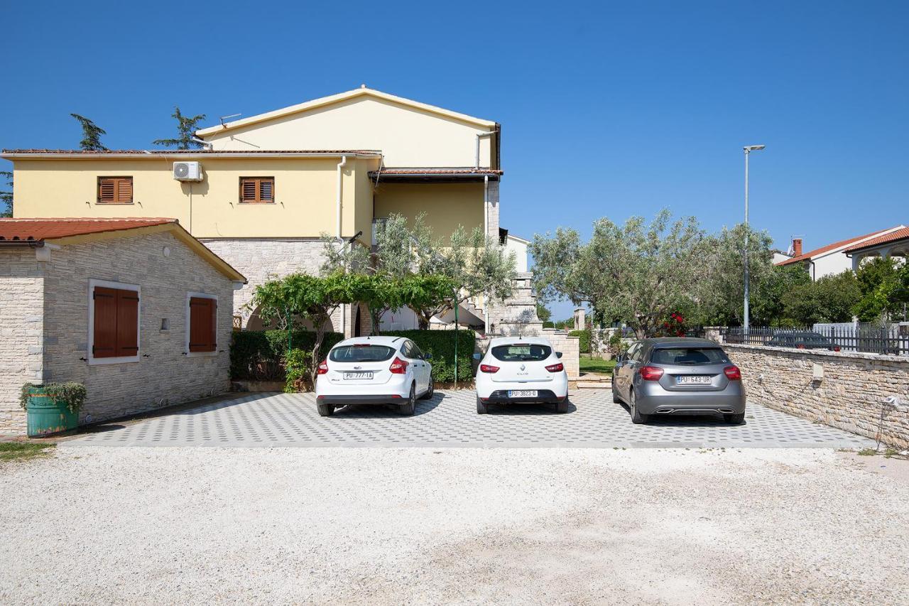 Modern Stone House With Flowers & Playground Medulin Exterior photo